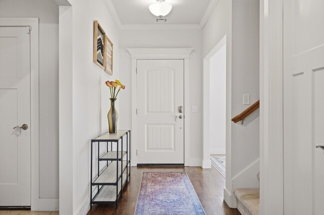 Building Photo - Stunner! This beautiful home features a spacious open floor plan with primary suite and private o...