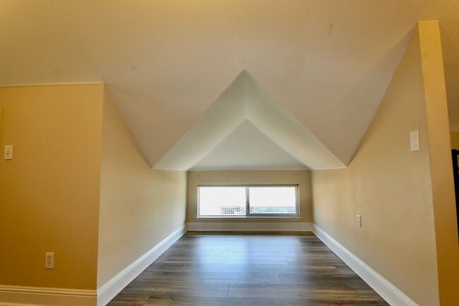 Building Photo - Two story unit w/ spiral staircase blocks ...