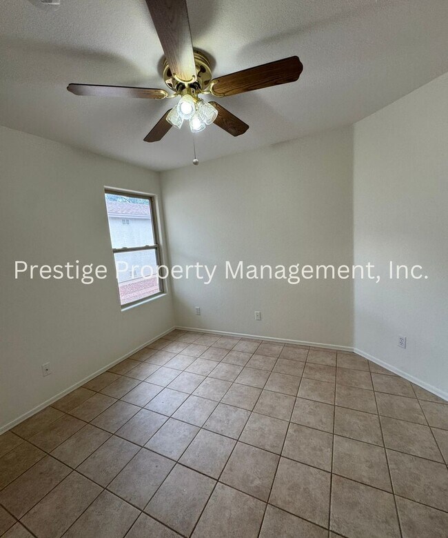 Building Photo - Charming All Tile 4/2 Rita Ranch Home