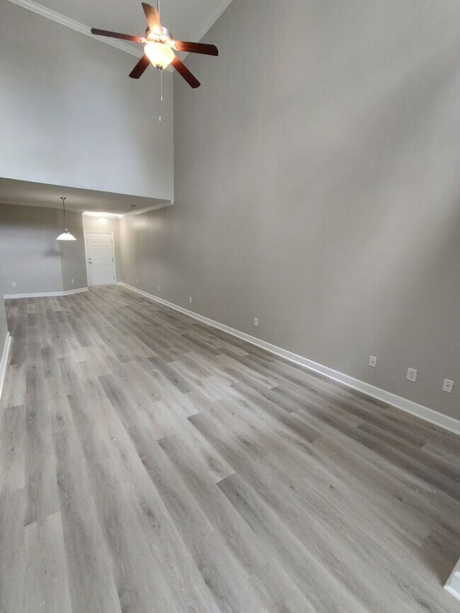 Building Photo - BRAND NEW FLOORING & FRESH PAINT - 3 Bedroom/2.5 Bath Townhome with garage in Wild Wing!