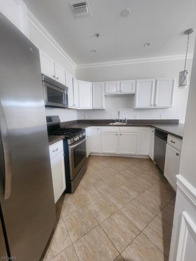 Building Photo - 1677 Springfield Ave