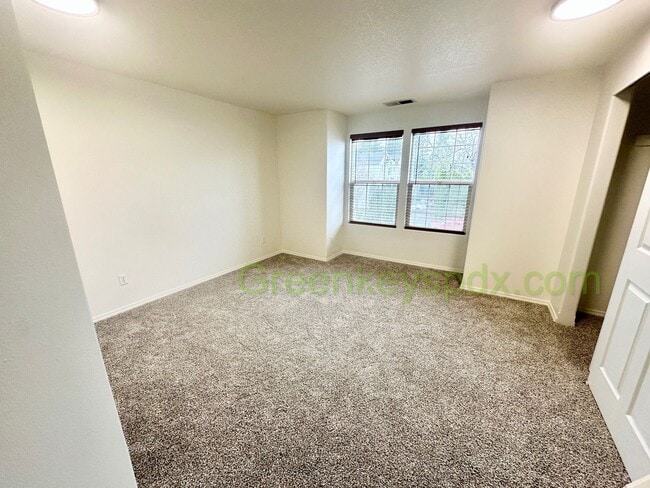 Building Photo - Amazing 2-Bedroom Townhouse with 2.5 Bathrooms, Attached Garage, Private Fenced Patio