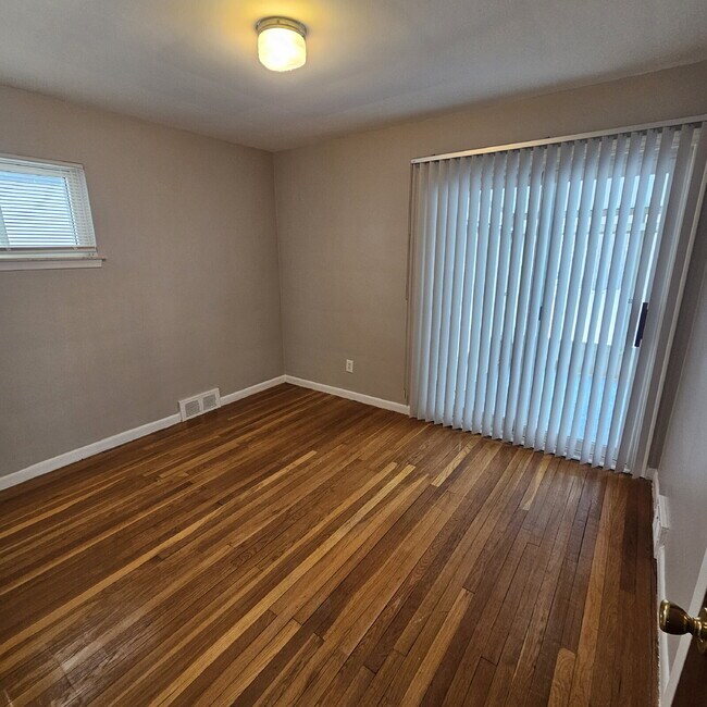 Building Photo - 3BR / 2BA Home in St. Clair Shores w/ Finished Basement, 3-Season Room & 2-Car Garage