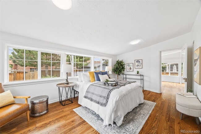 Building Photo - "Spacious 5-Bedroom Gem with Hardwood Floors & Cozy Fireplace in Denver's Heart!"