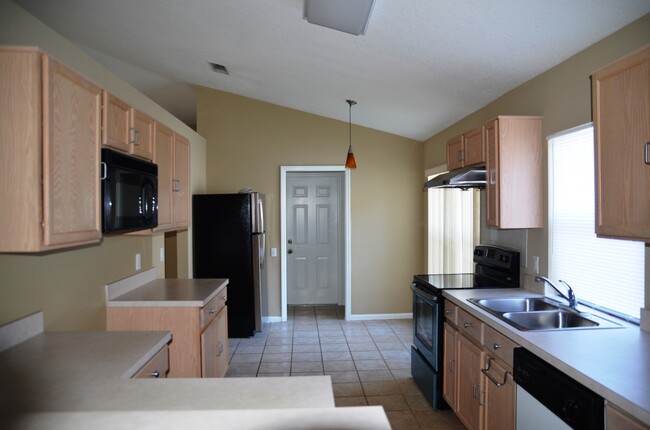 Building Photo - Nice 3/2 House w/2-Car Garage South of Dow...