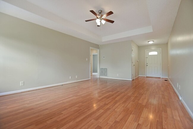 Building Photo - Pet Friendly Three Bedroom with Bonus!