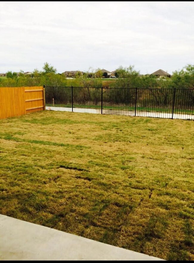 Building Photo - Make This Pflugerville Residence Your New ...