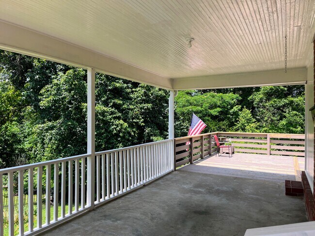 Covered carport leading to large deck - 3805 Knollwood Dr