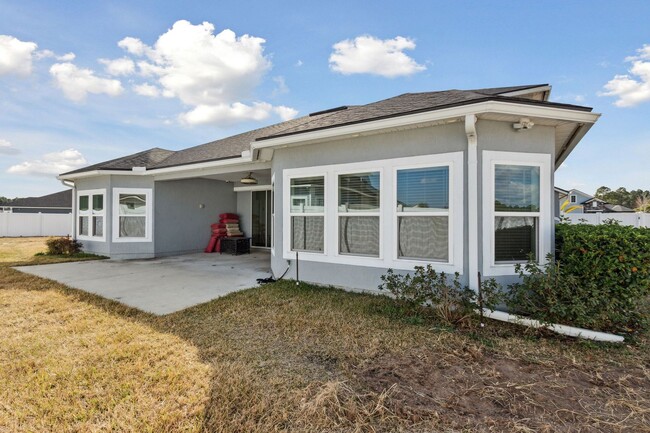 Building Photo - Spacious 5-Bedroom Home with Office, Den &...