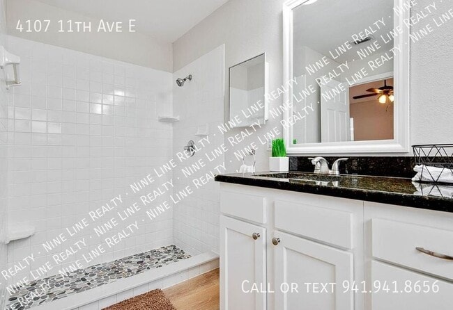 Building Photo - 4107 11th Ave E