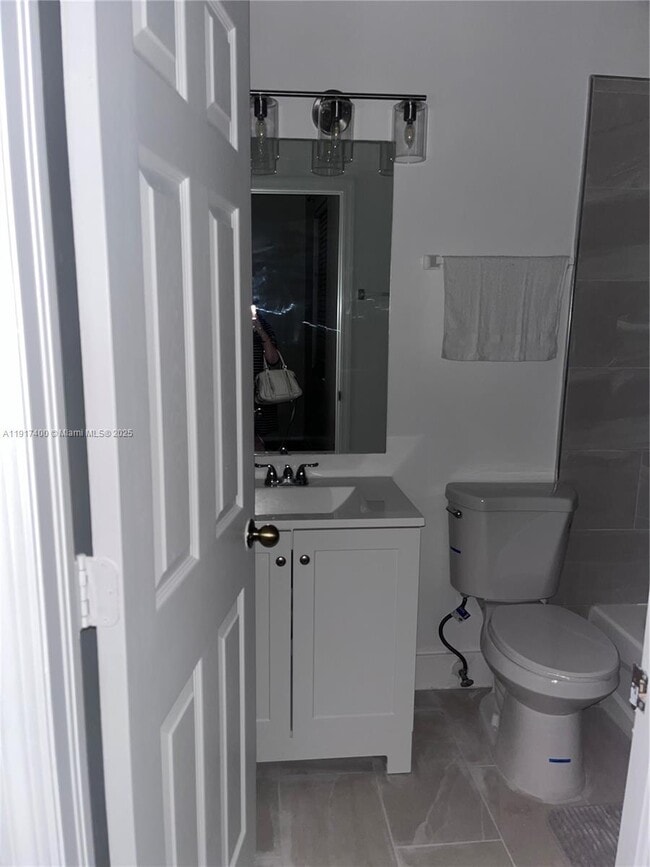 Building Photo - 3355 NE 13th Cir Dr