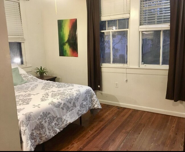 One of three bedrooms upstairs w/2 walk-in closets - 2427 Calhoun St