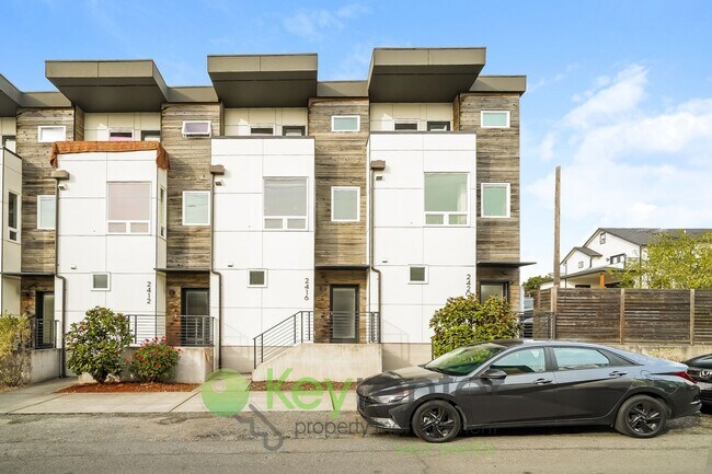 Building Photo - **Rent Special** Modern Two Bedroom Townhome with Designated Parking