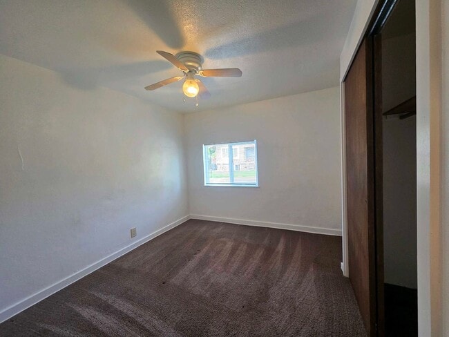 Building Photo - Cozy 2 Bed, 2 Bath Home with Parking Spaces and a Fenced Backyard!