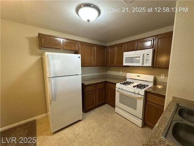 Building Photo - Spacious Southwest Condo with Open Layout & Resort-Style Community Amenities!