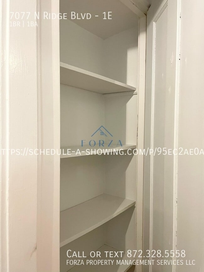 Building Photo - 7077 N Ridge Blvd