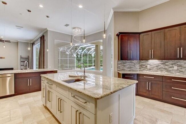 Building Photo - Stunning 5-Bedroom Pool Home on Nearly 2 A...