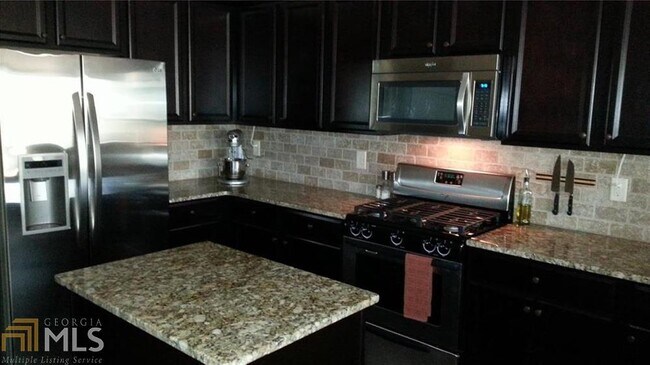 Building Photo - 6260 Crested Moss Dr