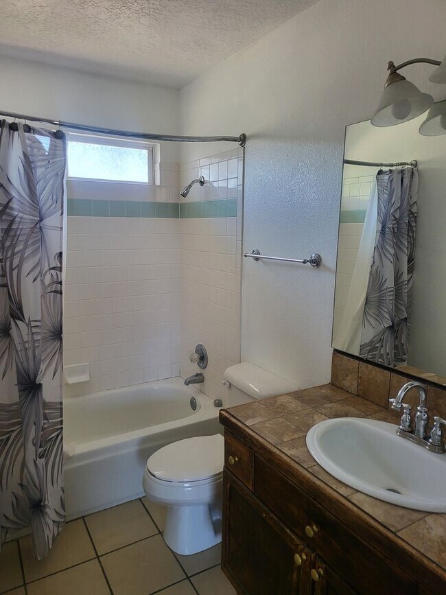 Building Photo - West Side 2/story 3 Bedroom 2 Bath & 2 Car...