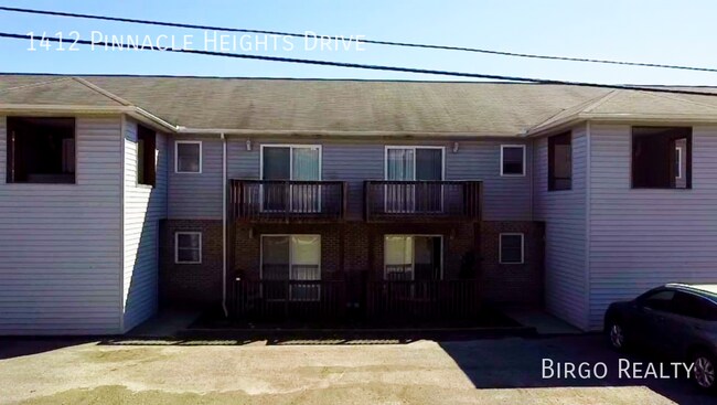 Building Photo - Move in Special! First Month's Rent is Fre...