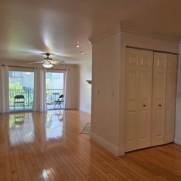 View of the living space; large storage space behind the double doors, including a washer-dryer - 3688 1st Ave