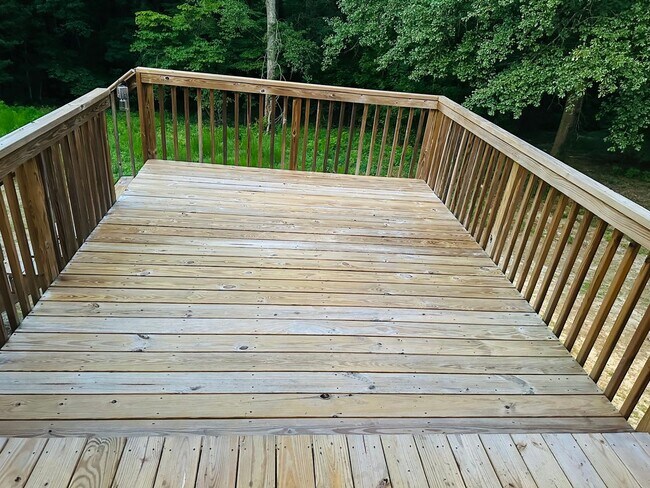 Building Photo - Spacious 4BR Home on 1.98 Acres with Modern Finishes in Tupelo Hills