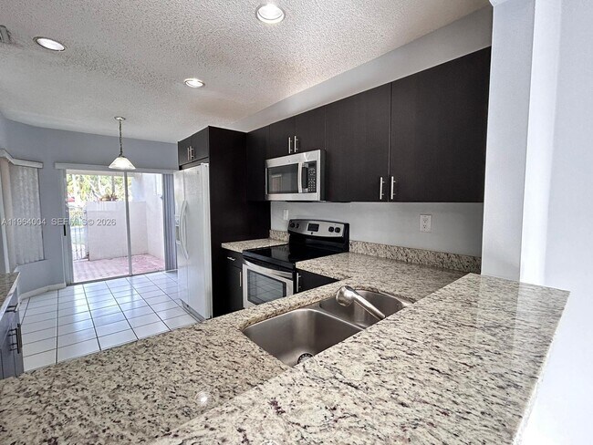 Building Photo - 9900 NW 43rd Terrace