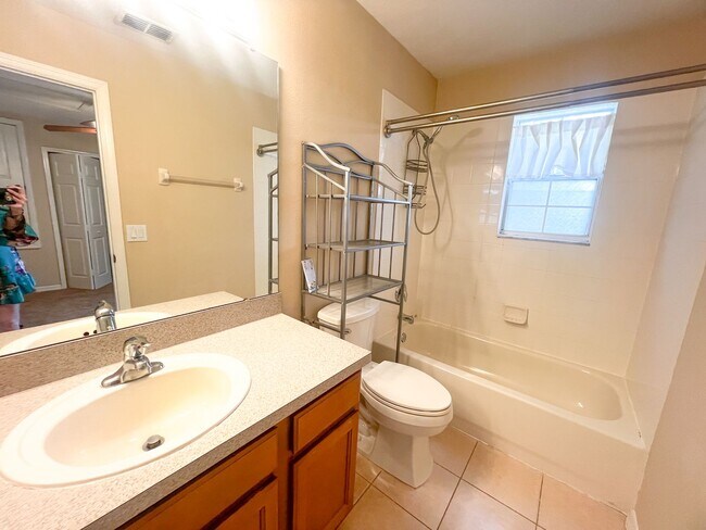 Building Photo - MOVE IN NOW-Water & electricity included 1x1 above garage apartment!! Full kitchen & bathroom!! W...