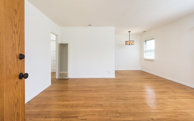 Living and dining room - 8704 El Manor Ave