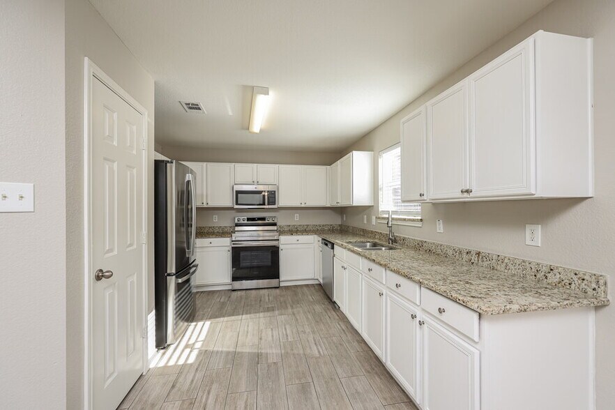 Building Photo - 7034 Wax Berry Dr