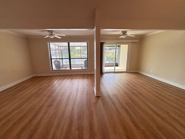 Building Photo - 2 Bed 2 Bath Luxury Waterfront Townhome with Screened Lanai & Garage!