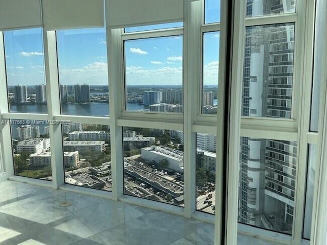 Building Photo - 18201 Collins Ave