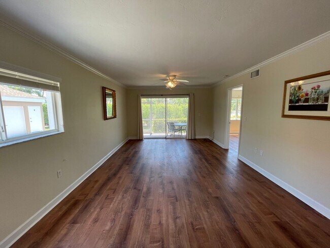 Building Photo - ANNUAL RENTAL - 3 BED / 2 BATH WITH CARPOR...