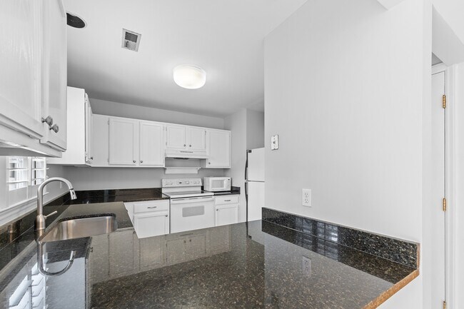 Building Photo - CONVENIENT AND AFFORDABLE