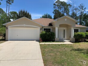 Building Photo - Like new 3/2/2 with screened in porch, gra...