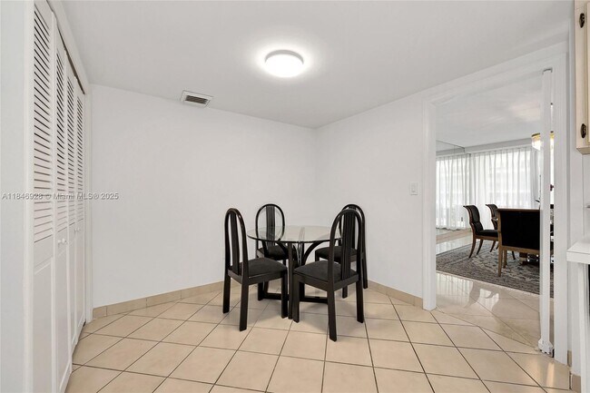 Building Photo - 10205 Collins Ave