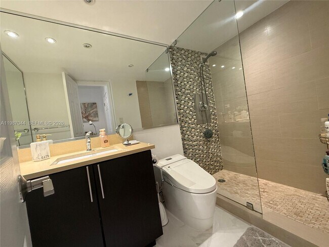 Building Photo - 5555 Collins Ave