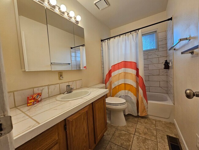 Building Photo - 4-Bedroom Home with In-Ground Pool, Solar ...