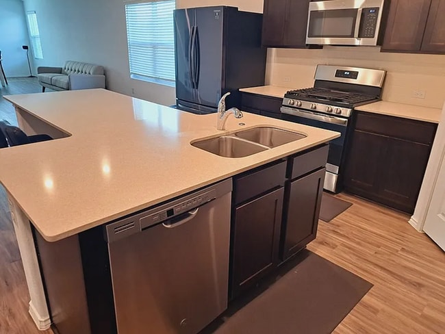 Building Photo - COMING SOON! Beautiful 4BR 3BA w/ Fenced Backyard • Private Yard• Attached Garage in Siena