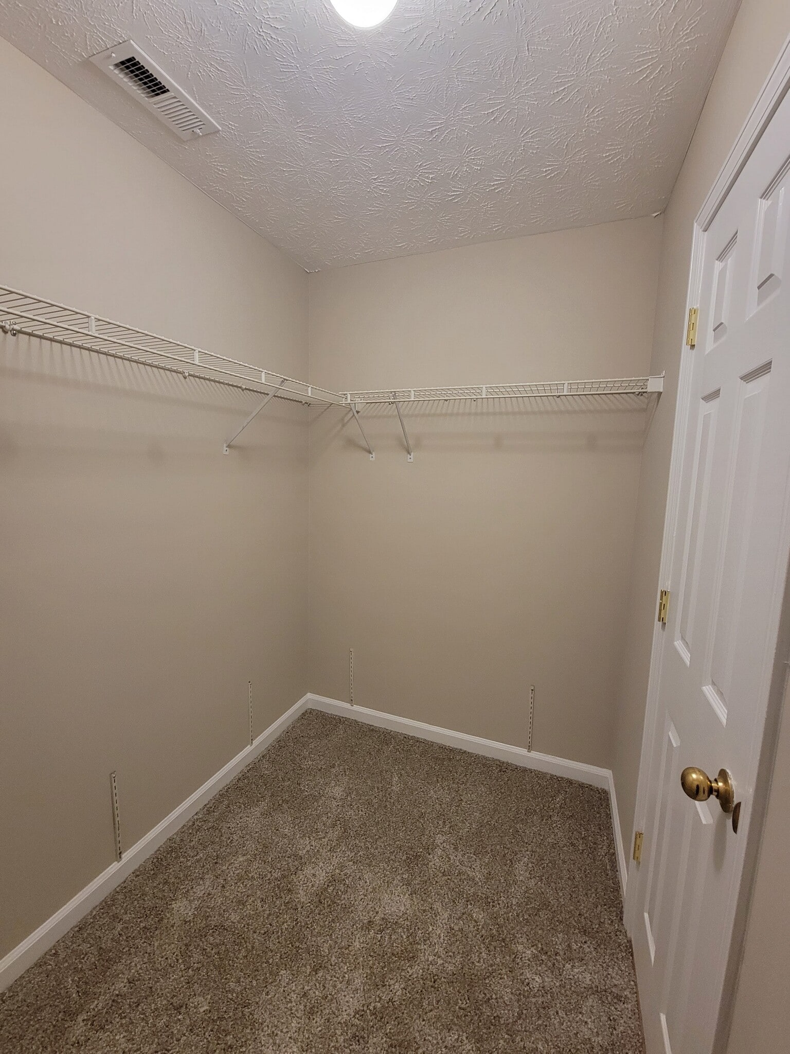 Primary bedroom closet - 119 Bay Court Dr