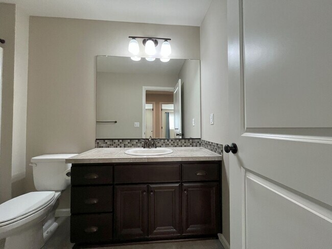 Building Photo - Spacious 4-Bedroom + Bonus Room with Modern Kitchen, Solar Panels & Private Fenced Backyard!