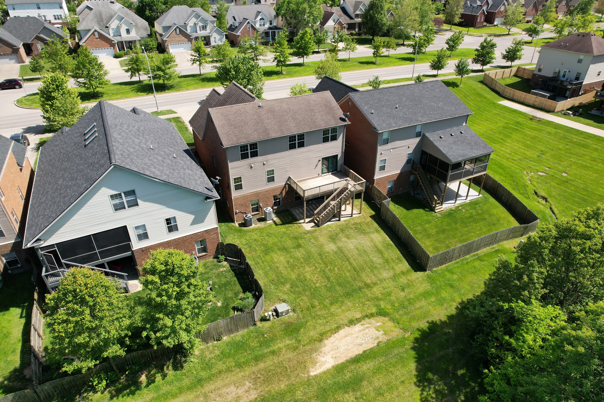Rear Exterior Elevated View, back yard and green spaces, 393 in the middle. - 393 Hays Blvd