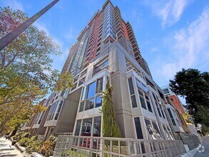 Building Photo - Modern 2BR/2.5BA with a Bonus Room Condo i...