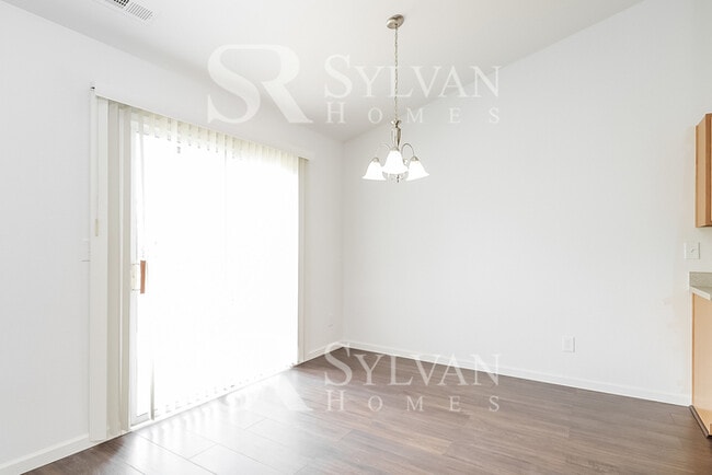 Building Photo - This adorable home is ready for your personal touch!