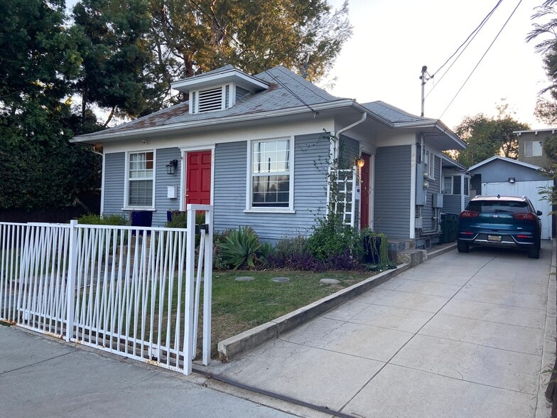 Gated driveway with plenty of parking - 607 N Garfield Ave