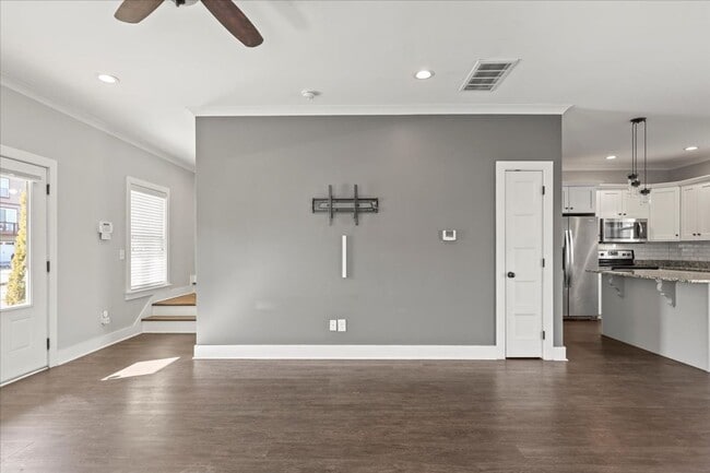 Building Photo - Your New Home! 3 Beds, 2.5 Baths, Hardwood Throughout, Fenced Back Yard, 3 Patios, + Community Pool!