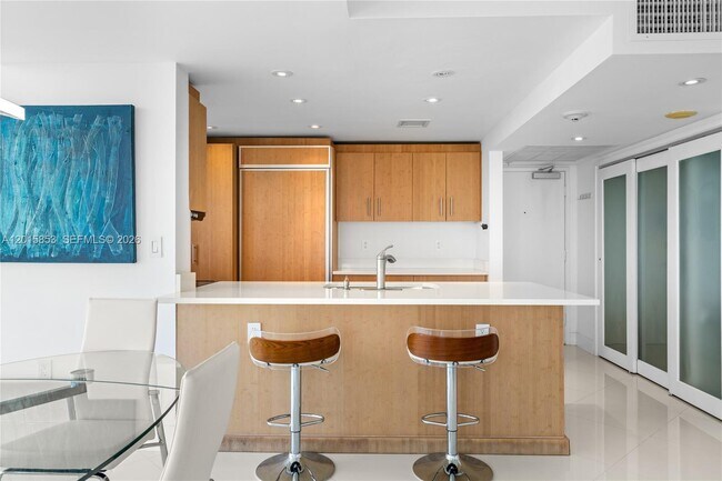 Building Photo - 10275 Collins Ave