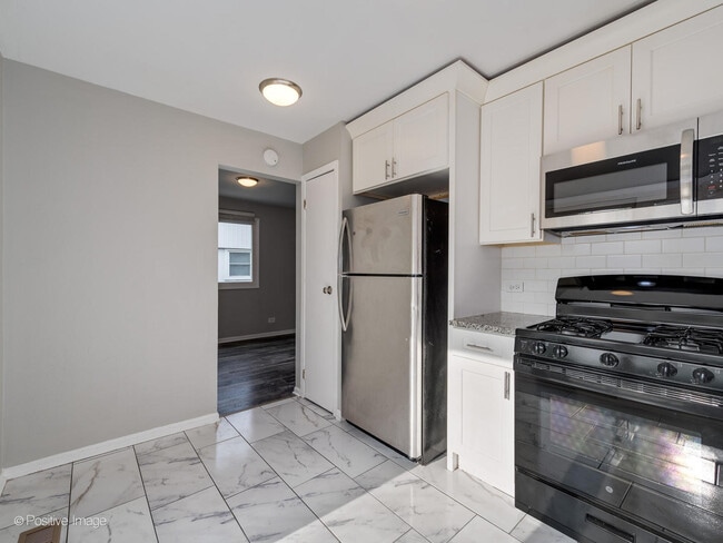 Building Photo - 22130 Kostner Ave