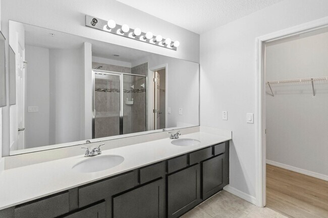 Building Photo - Bright & Stylish 3-Bedroom Townhome with Pond Views in Gated Seven Oaks