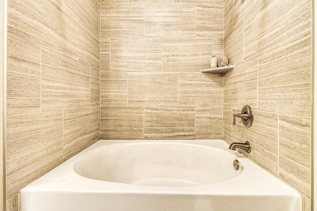 Building Photo - Modern Living in Houston’s Heart